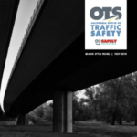 Black and white image of highway underpass with OTS logo